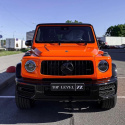 Mercedes g wagon w świetle dziennym w całości pokryty folią 100% tpu ppf w kolorze jasnej pomarańczy.