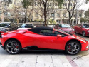 Lamborghini spyder widok z boku. Samochód cały pokryty folią ppf w kolorze crimson red gloss. Chroma guard - gswf.